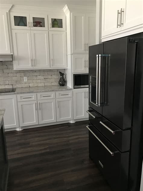 black stainless steel appliances with wood cabinets|white kitchen cabinets black appliances.